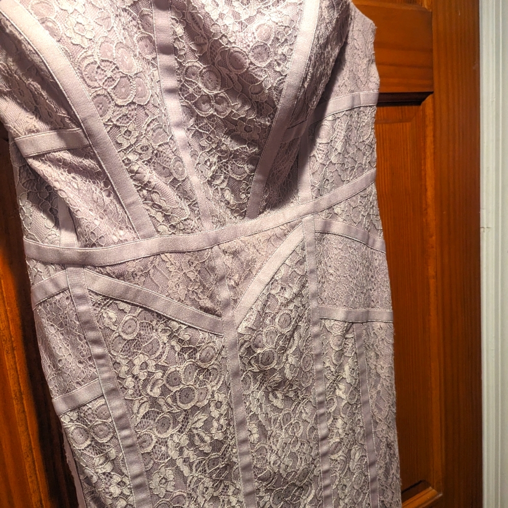 Light purple gown with bodice detail, minor pulling